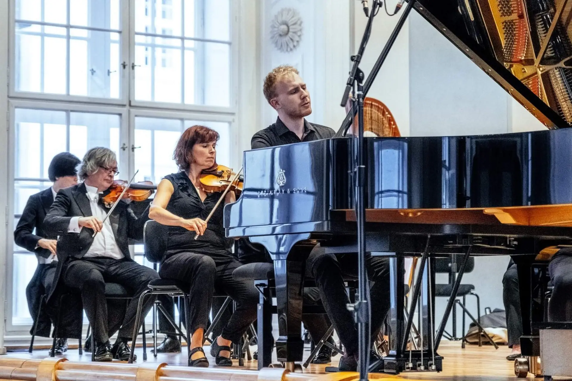 Jakub Sladek performing Schumann Piano Concerto in A minor with the Prague Philharmonia